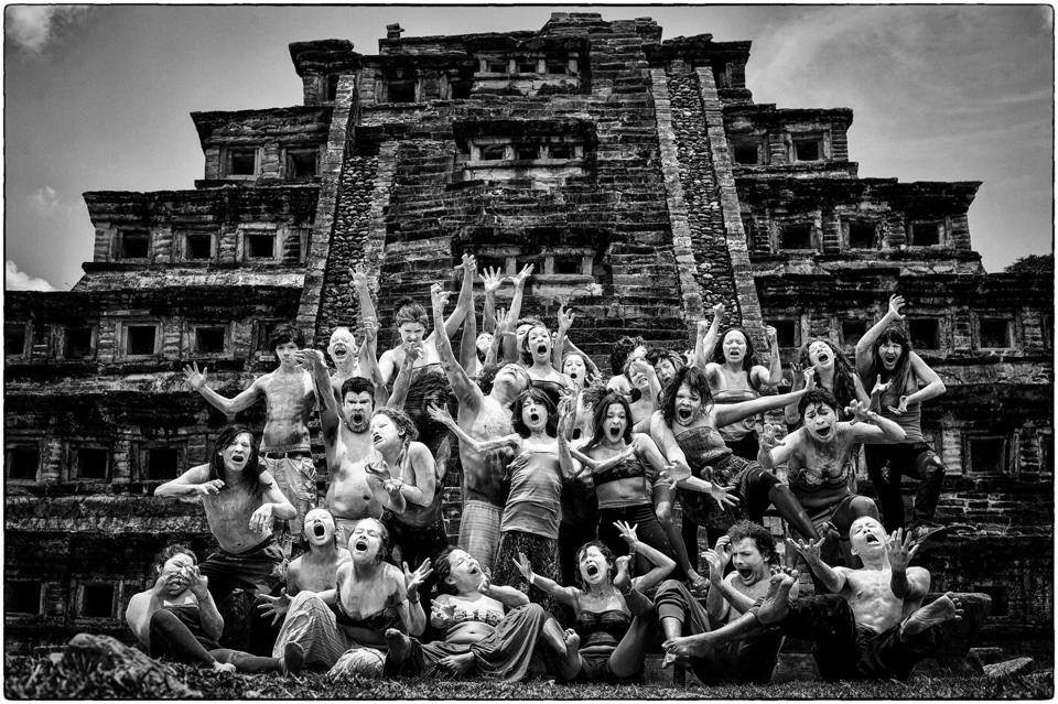 Group in front of ancient pyramid